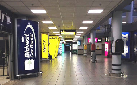 OR Tambo International Airport terminal interior under LED panel lighting